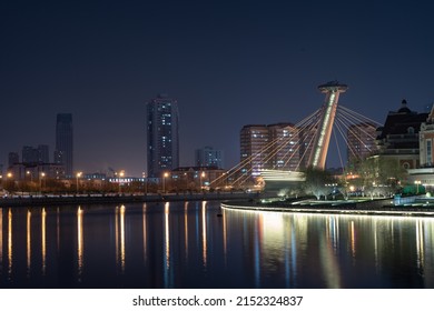 The famous bridge in Tianjin city at night along the Haihe River, China