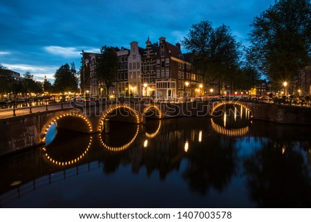 Famous canals of Amsterdam at night