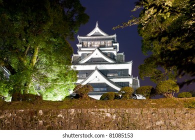 The famous castle in Japanese cisty of Kumamoto is in a fact a reconstruction of the historical building that was destroyed during the WW2. - Shutterstock ID 81085153