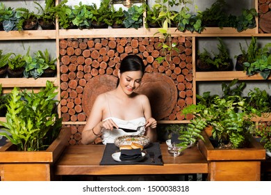 Famous Celebrity CEO Asian Beautiful Woman In White Gown Open Shoulder Have Review India Japanese Fusion Wood With Herb Garden And Will Live On Her Channel Later