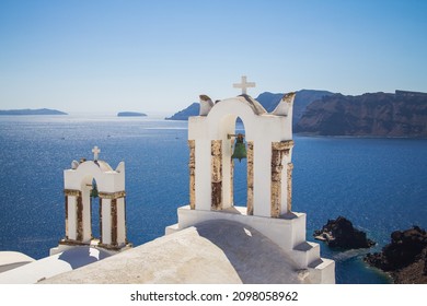 Famous church and bells of Oia Town on Santorini, Cyclades Islands, Greece 