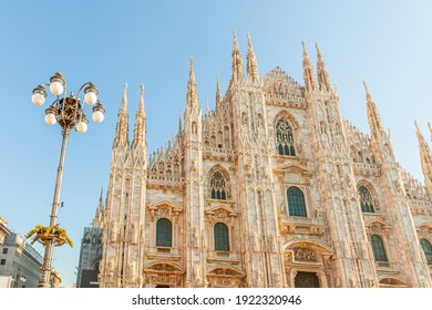 Famous Church Milan Cathedral Duomo Di Milano With Gothic Spires And White Marble Statues. Top Tourist Attraction On Piazza In Milan Lombardia Italy Wide Angle View Of Old Gothic Architecture And Art