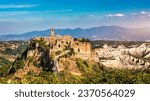 The famous Civita di Bagnoregio on a sunny day. Province of Viterbo, Lazio, Italy. Medieval town on the mountain, Civita di Bagnoregio, popular touristic stop at Tuscany, Italy.