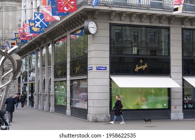 Famous Confectionery Named Sprüngli At Paradeplatz With Guild Flags Because Of Spring Festival Sechseläuten. Photo Taken April 19th, 2021, Zurich, Switzerland.