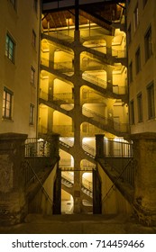 Famous Cour des Voraces illuminated at night. In old Lyon, France.
