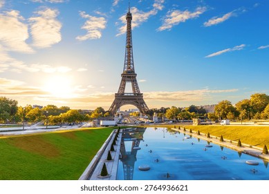 Famous Eiffel Tower view with sunset Trocadero Gardens Fountain reflection, Paris, France