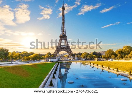 Famous Eiffel Tower view with sunset Trocadero Gardens Fountain reflection, Paris, France