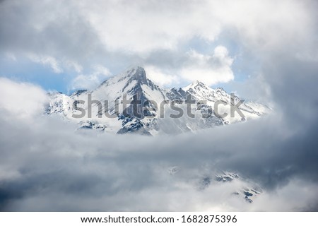 The famous Eiger mountain surrounded by clouds. 