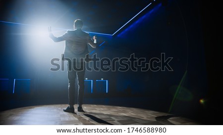 Famous Entertainer Gets on the Stage, Greets Audience, Starts Performance. Software Company Founder, Tech Marketing Guru Making a Pitch, Presentation Speaker Giving Talk. Cinematographic Shot