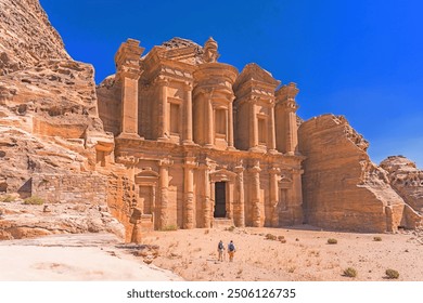 Famous facade of Ad Deir in ancient city Petra, Jordan. Monastery in ancient city of Petra. The temple of Al Khazneh in Petra is one of UNESCO World Heritage Sites and one of the world wonders - Powered by Shutterstock