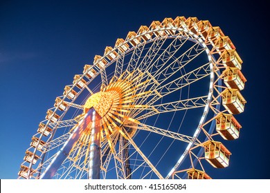 famous ferris wheel at the oktoberfest in munich - germany
