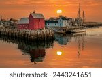 Famous fishing shack at sunset in boat harbor at Rockport, MA.  Rockport is a town in Essex County, Massachusetts, United States