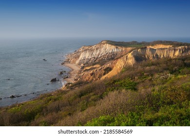 The famous gay head cliffs in Aquinnah Massachusetts as the sun sets on Martha's Vineyard. - Shutterstock ID 2185584569