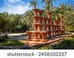 Famous Glorieta fountain in the palmeral municipal park in Elche, Alicante, Valencian Community, Spain