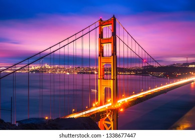 Famous Golden Gate Bridge in San Francisco at night seen from Battery Spencer viewpoint. Long exposure.