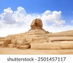 Famous Great Sphinx and Great Pyramid of Cheops, Cairo, Egypt. Ancient statue of Sphinx, mythical creature with head of man and body of a lion, Giza pyramid complex (Giza Necropolis)