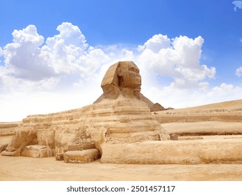 Famous Great Sphinx and Great Pyramid of Cheops, Cairo, Egypt. Ancient statue of Sphinx, mythical creature with head of man and body of a lion, Giza pyramid complex (Giza Necropolis)