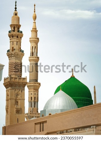 The famous green  domes of the Prophet's Mosque. Masjid an-Nabawi. The mosque was founded by Prophet Muhammad.