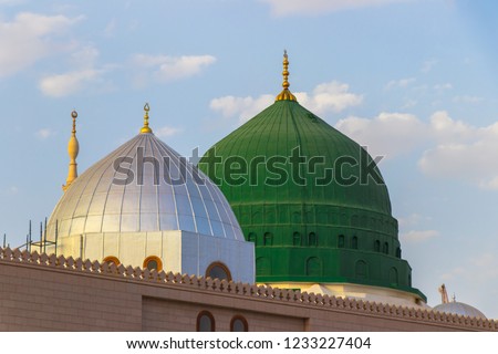 The famous green and silver domes of the Prophet's Mosque. Masjid an-Nabawi. The mosque was founded by Prophet Muhammad.