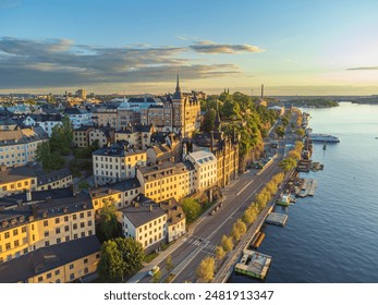 Famous hill of Stockholm, Södermalm district, near Söder Mälarstrand street, at sunset in summer. Marie mountain (Mariaberget). Montelius road and historical buildings. Aerial view. - Powered by Shutterstock