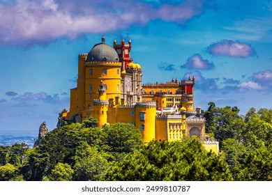 Famous historic Pena palace part of cultural site of Sintra against sunset sky in Portugal. Panoramic View Of Pena Palace, Sintra, Portugal. Pena National Palace at sunset, Sintra, Portugal.  - Powered by Shutterstock