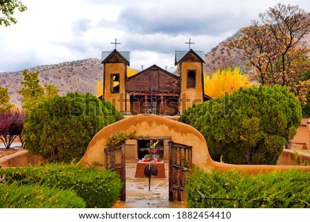 The famous historic Sanctuary of Chimayo with a garden in New Mexico, US