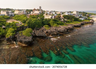 A famous island in South Taiwan, Xiao Liuqiu in Pingtung, Taiwan. Aerial landscape of sunny day, clear ocean, beach, shore, transparent water and coral reef. It is nearby Kaohsiung.