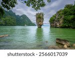 Famous James Bond island near Phuket, Thailand. Travel photo of James Bond island with traditional beautiful sandy beach in Phang Nga bay, Thailand.