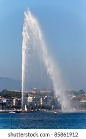 The famous Jet d'Eau fountain in Geneva, Switzerland with tourists