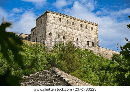 The famous Kalaja e Gjirokastres castle of Gjirokastra in Albania under a blue sky in summer