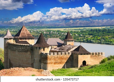 Famous Khotyn Fortress in Ukraine over beautiful landscape with blue cloudy sky - Shutterstock ID 135473717