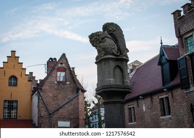 The famous lions of Huidenvettersplein square in Bruges, West Flanders, Belgium, Europe. Unesco heritage site. Flemish Symbols. 