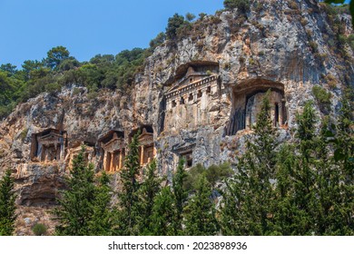 Famous Lycian Rock Tombs of ancient Caunos town, Dalyan, Mugla, Turkey. Rock-cut temple tombs in Kaunos, one of the ancient architectural wonders of Turkey, carved into the cliffs