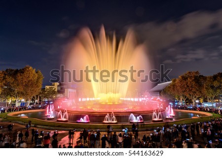The famous Magic Fountain light show at night. Plaza Espanya in Barcelona, Spain