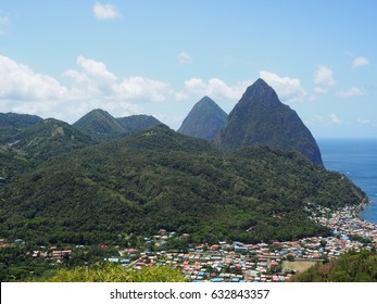 The Famous Mountainous View Of The Pitons In Soufrière, St. Lucia Looking From Viewpoint Over The Island Village Full Of Colorful Rooftops And Ocean View 