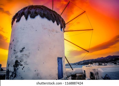 Famous Mykonos Town Windmills In A Sunrise At  Early Morning, Mykonos Island, Greece/ Colorful Sky.