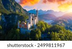 Famous Neuschwanstein Castle with scenic mountain landscape near Fussen, Bavaria, Germany. Neuschwanstein Castle in Hohenschwangau, Germany. 