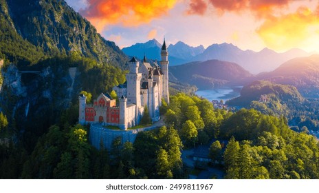 Famous Neuschwanstein Castle with scenic mountain landscape near Fussen, Bavaria, Germany. Neuschwanstein Castle in Hohenschwangau, Germany.  - Powered by Shutterstock