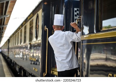 Famous Orient Express long distance passenger train stopped in Bucharest central train station. - Shutterstock ID 2203246723
