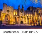 Famous Palais des Papes illuminated at night in Avignon, Vaucluse, Provence, France