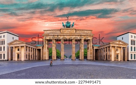 Famous Panorama of Brandenburg Gate or Brandenburger Tor at sunrise, Berlin, Germany