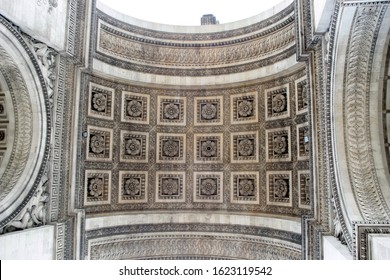 Famous Parisian Monument Arc De Triomphe. The Ceiling With 21 Sculpted Roses. Overhead Decorative Elements Of The Triumphal Arch In Paris, Close Up Detaile View. Historic Building In The City Centre.