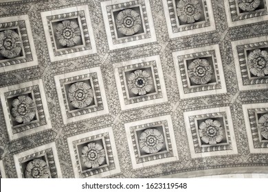 Famous Parisian Monument Arc De Triomphe. The Ceiling With 21 Sculpted Roses. Overhead Decorative Elements Of The Triumphal Arch In Paris, Close Up Detaile View. Historic Building In The City Centre.