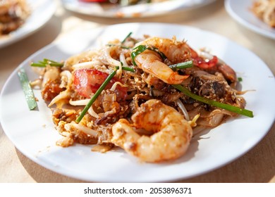 Famous Penang Char Kuey Teow with big prawns.