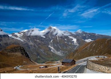 Famous picturesque views of the road in Austrian Alps - Grossglocknershtrasse. The highest mountain peaks covered with fresh snow