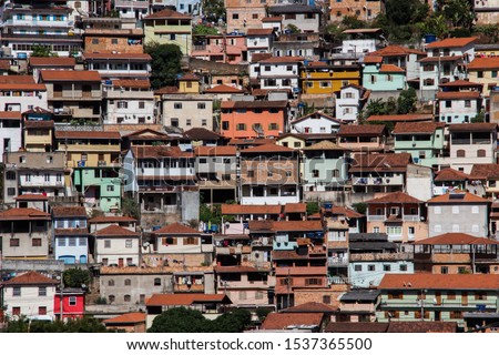 The famous poor neighborhoods of the slums of Brazil and Rio de Janeiro. Favelas of the city of Ouro Preto. Panorama of poor houses in dysfunctional neighborhoods.