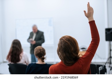 A famous professor has arrived at the university to conduct a special lesson, the student pulls his hand up to ask him a question