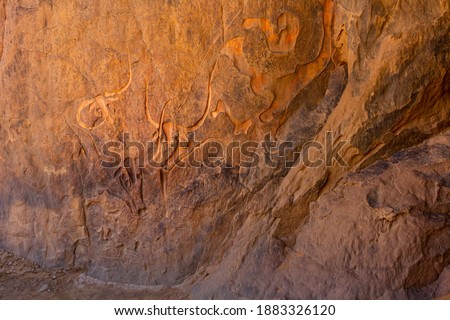 Famous rock relief carving  of a crying cow at Tegharghart,   near Djanet, Tassili nAjjer National Park, South Algeria, North Africa, 