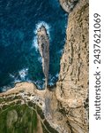 Famous rock in the sea. Drone top view. Malta island
