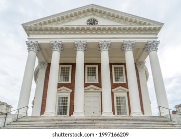 The famous rotunda building of the University of Virginia in Charlottesville with classic Greek arches design by President Jefferson iconic building of the campus with neutral sky